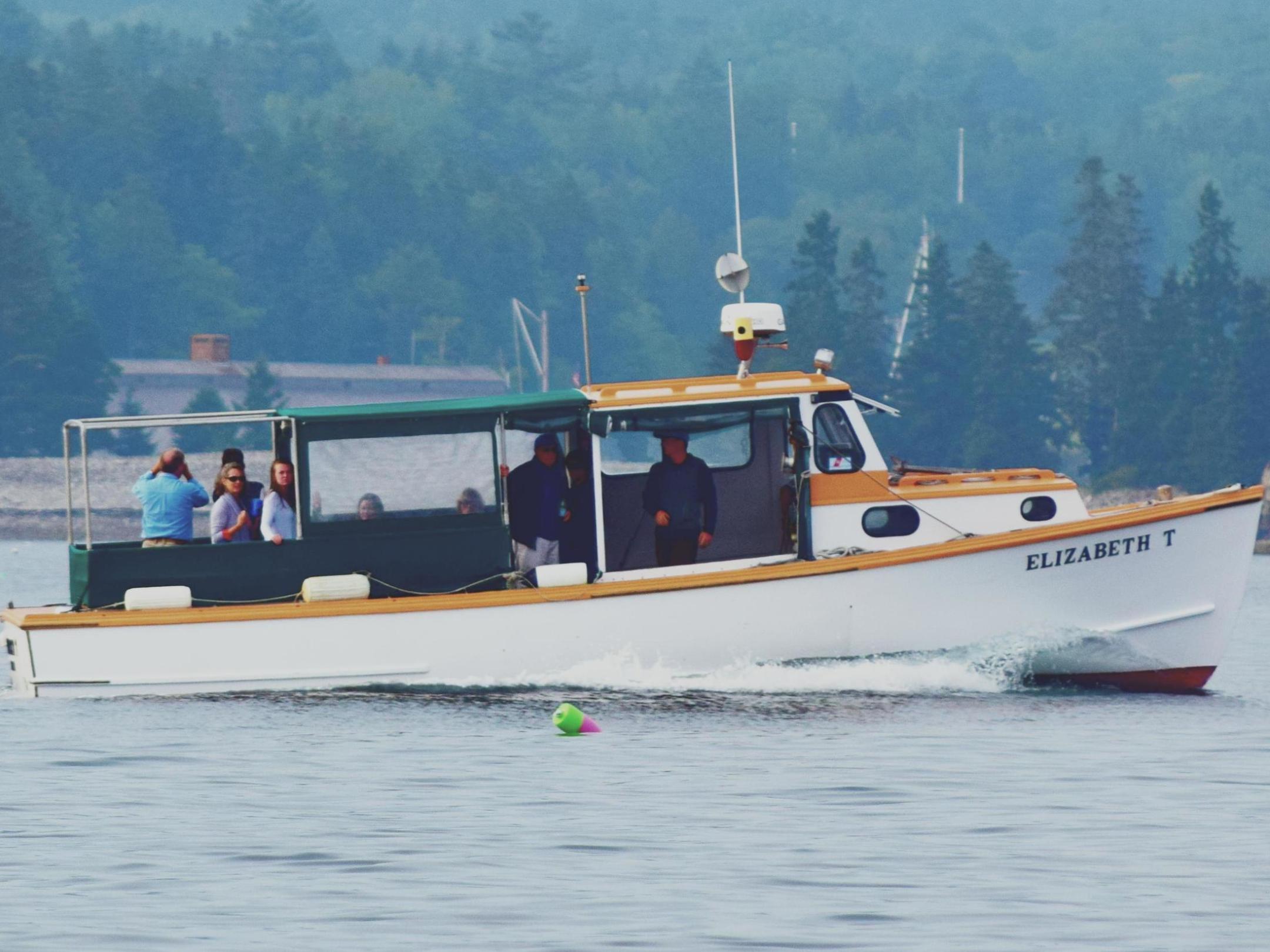 a small boat in a body of water