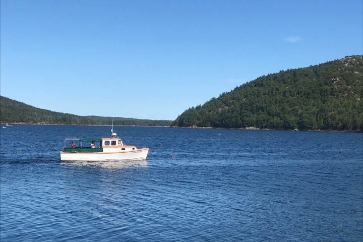 a small boat in a large body of water